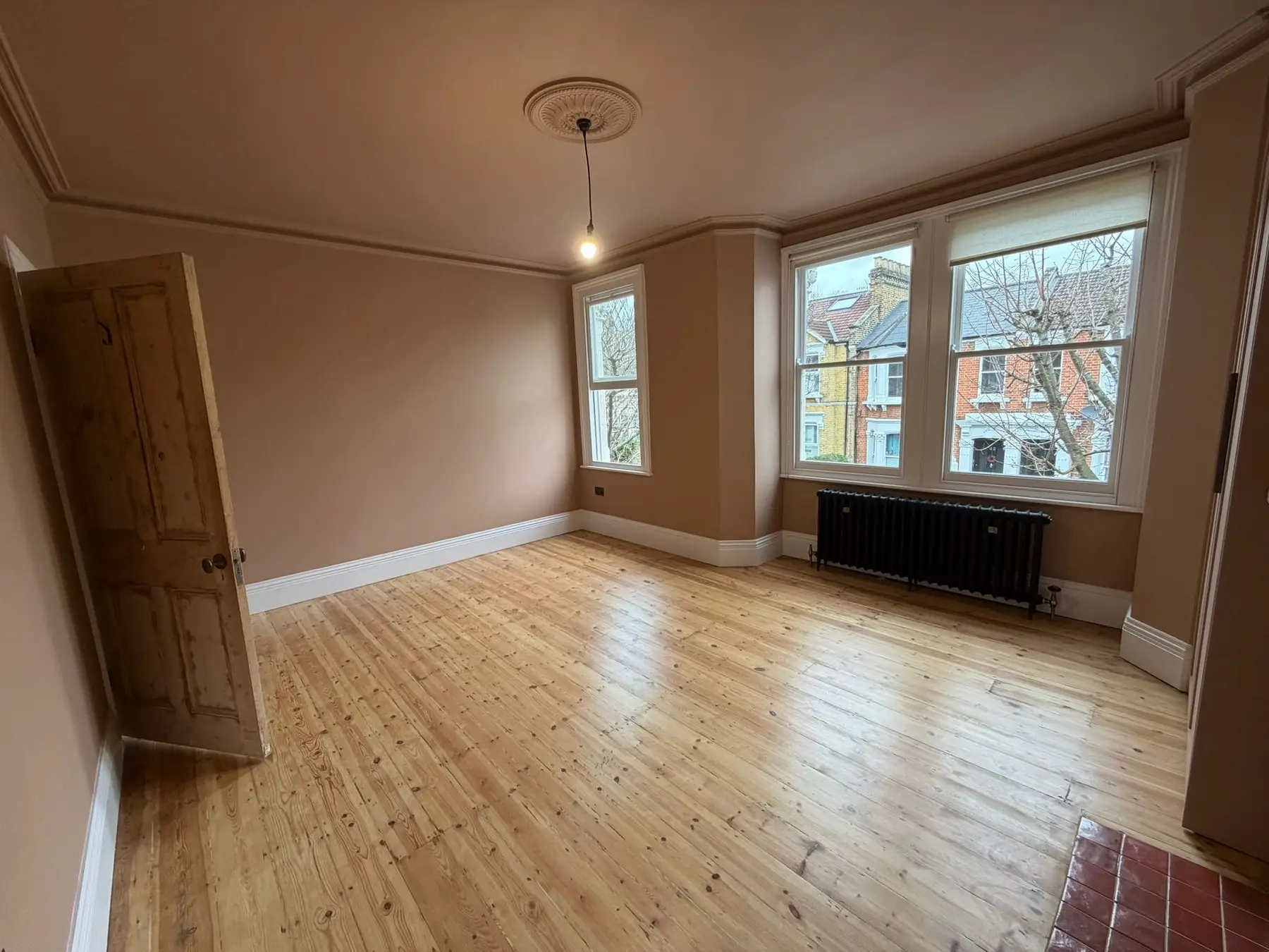 Bedroom plastered and painted, with the cornice and ceiling rose restored and a sanded pine floor