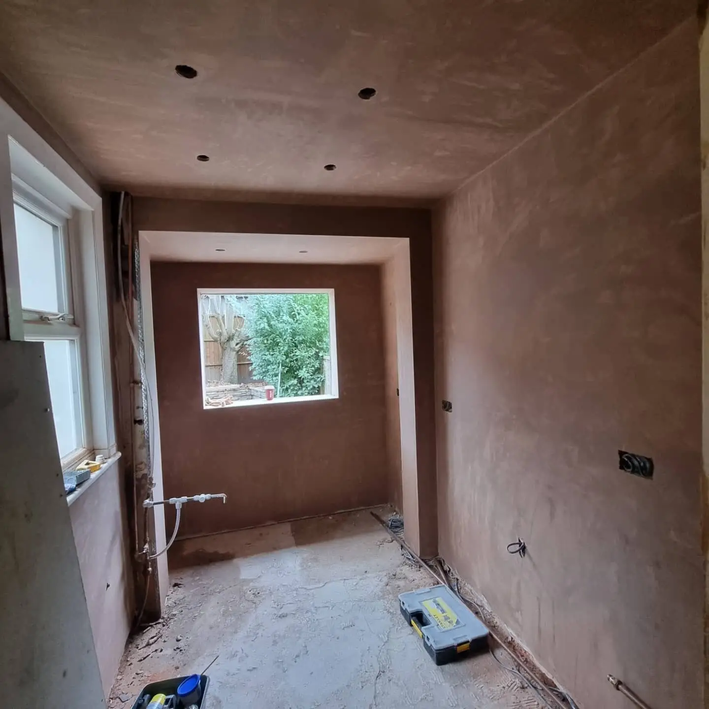 Room freshly skimmed, plaster drying before decorating